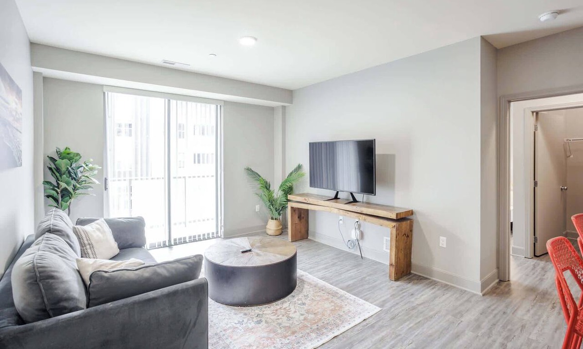 Central Business District Apartment | CozySuites at the Banks gym, pool 16