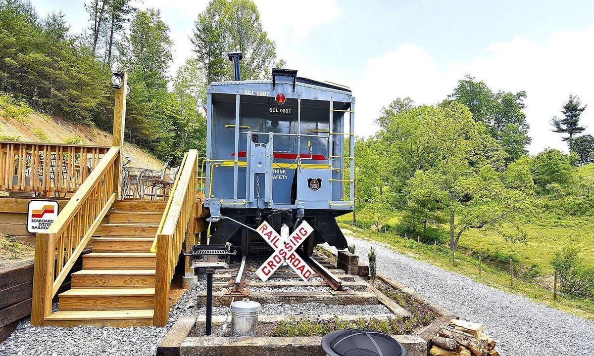 Clyde House | Glamping Caboose Rental Perfect for Families near Clyde, North Carolina