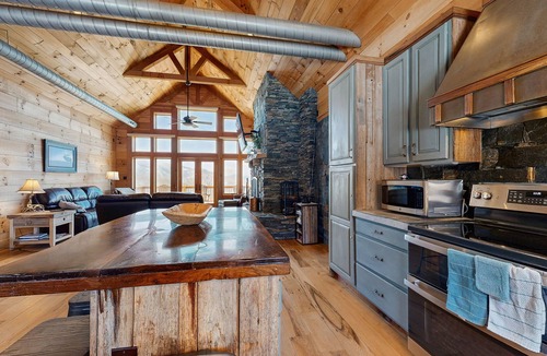 Elk Park House | 60 Acre mountaintop retreat w/game room, chef's kitchen & fireplace