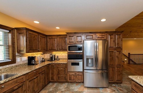 Waterfront Greens House | 6BR Luxury Escape w/Indoor Pool Boat Dock Avail