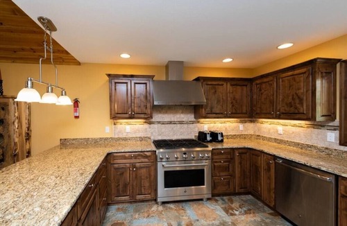 Waterfront Greens House | 6BR Luxury Escape w/Indoor Pool Boat Dock Avail