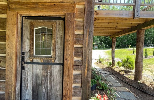 Nebo Cabin | Beautiful Log Cabin nestled on pond w/balcony for sunsets and stargazing.