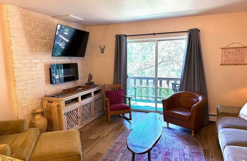 Estes Park Condo | Bright, newly updated condo with river view off deck, close to the National Park