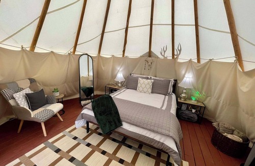 Farmers Resort | Buck Wild Teepee at The Edge—Unique Riverfront Glamping in Salt Lick, KY