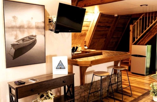 Slade House | Canoe Believe It Cabin | Indoor Jacuzzi Tub