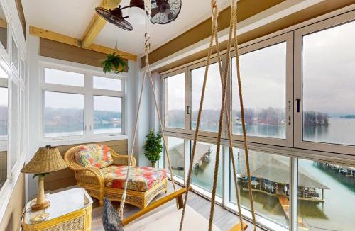 Huddleston House | Chic Waters - Spacious lakefront condo w/shared pool, hot tub, tennis court, private balcony