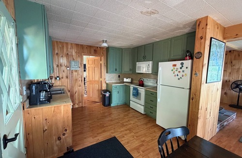 Barndoor Island House | Classic Lake Winnipesaukee Camp with Breathtaking Views