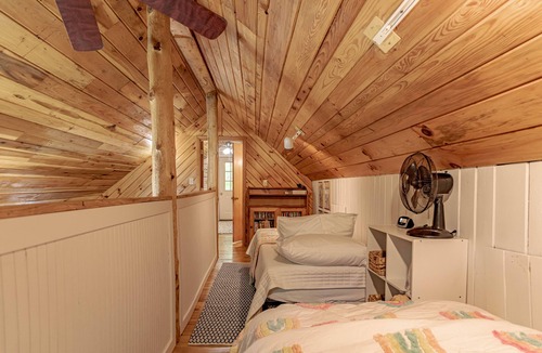Rogers Cottage | Come relax in our cozy cottage nestled in the woods overlooking Lake Millie.