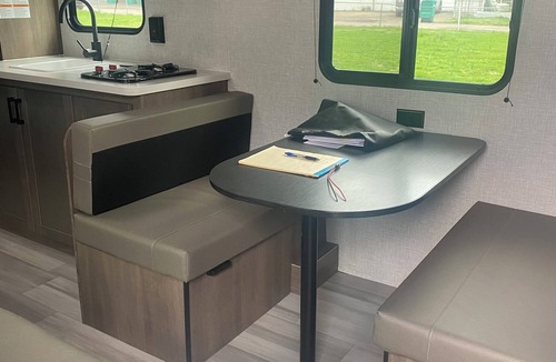 Keslers Cross Lanes RV Rental | Cozy 1-bedroom camper in tranquil setting with AC and heat. Sleeps 4.