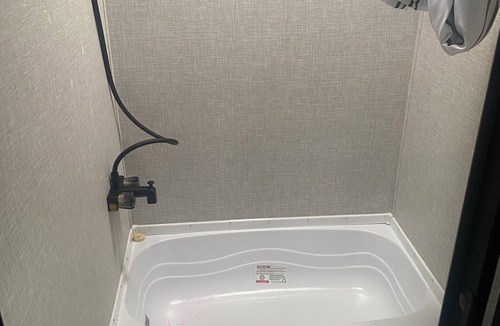 Keslers Cross Lanes RV Rental | Cozy 1-bedroom camper in tranquil setting with AC and heat. Sleeps 4.