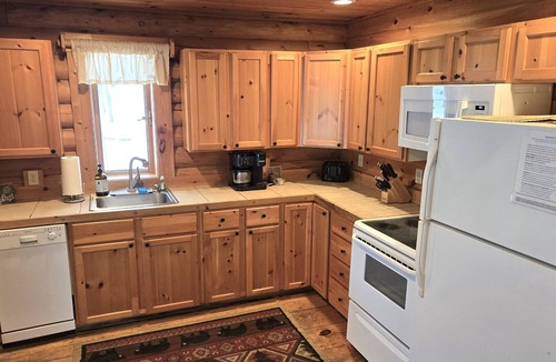 Thayerville Cabin | Cozy 2-Bedroom Log Cabin w/Hot Tub & Fireplace - Ski at Wisp & Walk to Lake