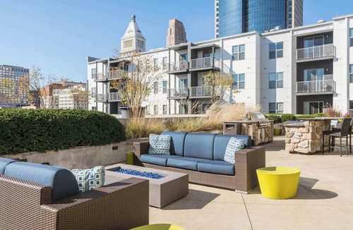 Central Business District Apartment | CozySuites at the Banks gym, pool 11