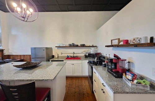 Vevay Apartment | Delaney's Saloon Fully Equipped, Furnished, And Pet Friendly Close to The Ark, Creation Museum, and Kat Von Ds Tulip Field