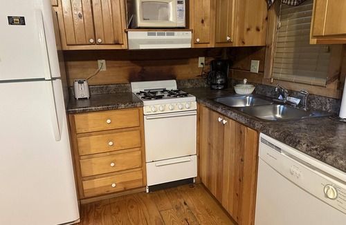 Candler Cabin | Escape to Nice & Knotty—A Romantic Cabin.
