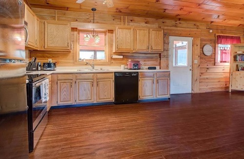 Means Cabin | Family and Pet friendly countryside cabin with spacious yard.