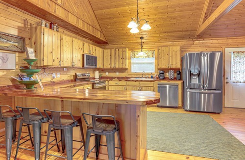 Boswell Cabin | Fire Pit, Screened Deck: Riverfront Ozarks Cabin!