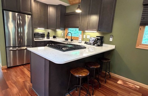 Baker Cabin | Honey Hideaway cabin on 2.5 acres fire pit outdoor workout Family Pets Welcome