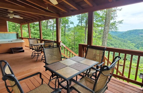 Rogers Cabin | Inviting and charming, 3-BR, 2-BA log cabin with phenomenal view! King Beds.