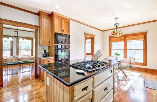 Mill Spring House | Lakeview retreat with Free Wifi, hot tub, fireplaces, patio, balcony, & grill