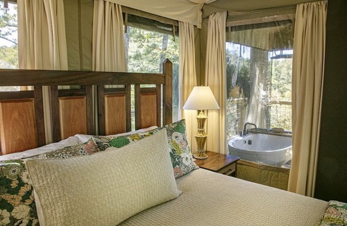 Zirconia Cabin | Luxury Family Tree Tent with Private Deck, Soaking Tub & Pizza Oven Near Waterfalls, Zirconia, North Carolina