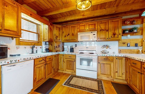 Baneberry Cabin | Luxury lakefront cabin with free attraction tickets, fire pit, dock & deck