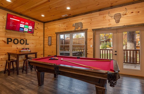 Chalet Village North House | Modern Cabin Movie Theater Hot Tub Game Room
