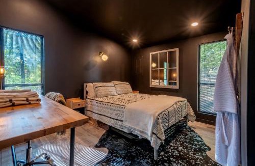The Woods House | Modern Forest Cabin with Hot Tub, Screened Porch & Resort Access Near Hedgesville, WV
