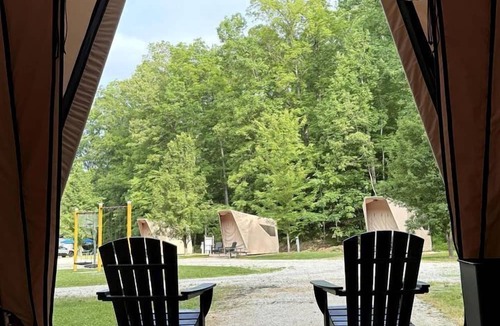 Hitchins RV Rental | Modern Safari Tent Rental with AC and Trails in Grayson, Kentucky