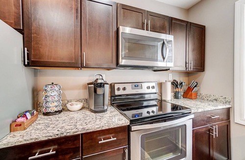 Oakley Condo | Oakley Square 2BR Condo-Walkable with Free Parking