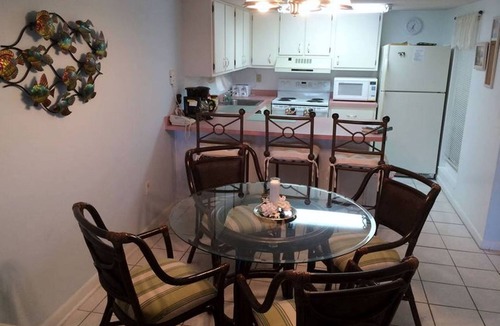 Crescent Beach Condo | OCEAN FRONT! Beautiful views Ground Floor End Unit! Private Dock & boat ramp.