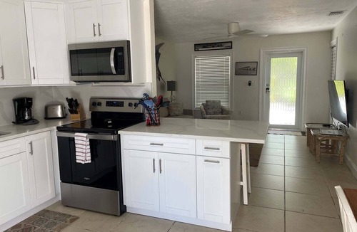 Layton House | Oceanfront Duplex with Beautiful Beach & Dock for Boat Access - Dogs OK