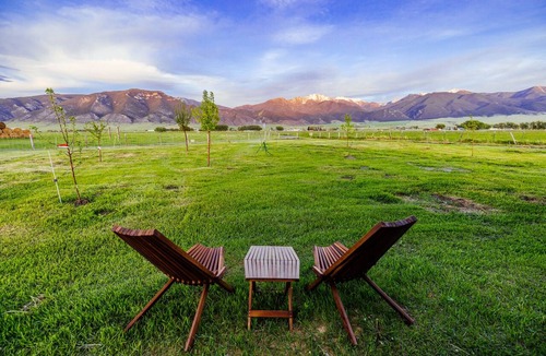 Whitehall House | Off-grid tiny home farm stay with incredible mountain views!