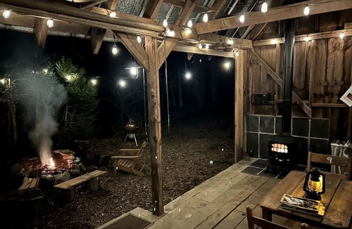 Zirconia Cabin | Peaceful Cabin Stay with Fire Pit, Sauna & Mountain Adventure in Zirconia, North Carolina