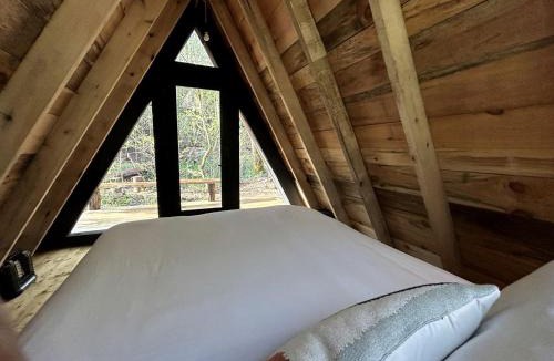 Zirconia Ski Chalet | Secluded Off-Grid Cabin Retreat with Fire Pit & Sauna in Zirconia, North Carolina