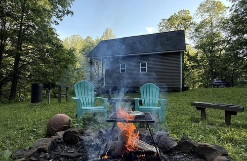 Scottown Cabin | Secluded Off-Grid Cabin with Waterfall & Hiking Trails Near Rome Township, OH