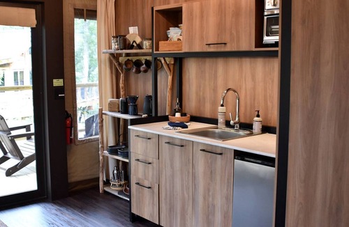 Zirconia Cabin | Secluded Tree Tent with Outdoor Soaking Tub & Pizza Oven Near Blue Ridge Waterfalls, Zirconia, North Carolina