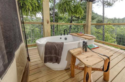 Zirconia House | Secluded Tree Tent with Outdoor Soaking Tub & Pizza Oven Near Blue Ridge Waterfalls, Zirconia, North Carolina