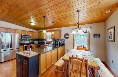 Bloomington House | Spacious forest retreat with grill, firepit, game room, & jacuzzi tub - dogs ok