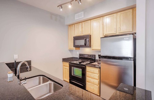Central Business District Apartment | Stylish 1BR/1BA CozySuites at the Banks