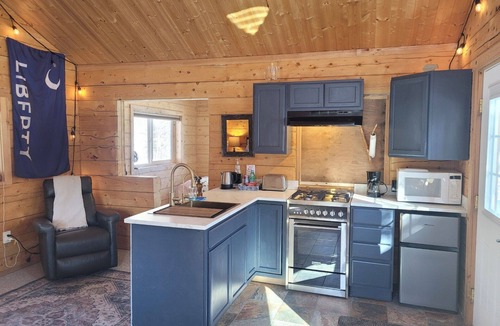 Sutton Cabin | The Blue Moon cabin. Surrounded by 360 degree breathtaking mountain views.