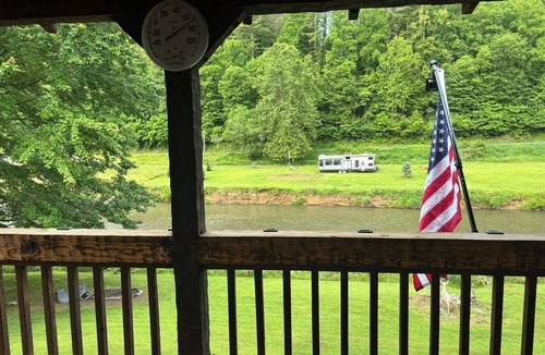 Lansing Cabin | The Boatright Retreated nestled on the river.