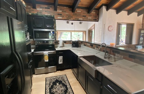 Gormania Cabin | The eclectic lodge sits on 10 acres and is within 40 minutes from 3 ski resorts.