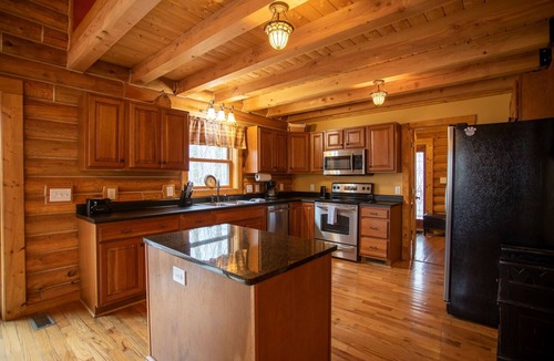Sugar Mountain House | The Feisty Fox - Beautiful log cabin with hot tub on sugar mountain with outdoor fireplace!