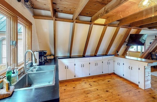 Franklin House | Waterfront A-frame on George's Pond with views, private dock, beach, kayaks, SUP