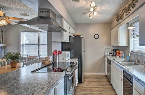 Mid America Condo | Waterfront Hot Springs Condo w/Boat Slip & Pool!