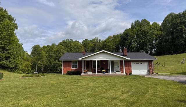3-Bedroom Farmhouse under Roan Mountain, on 20 private acres.