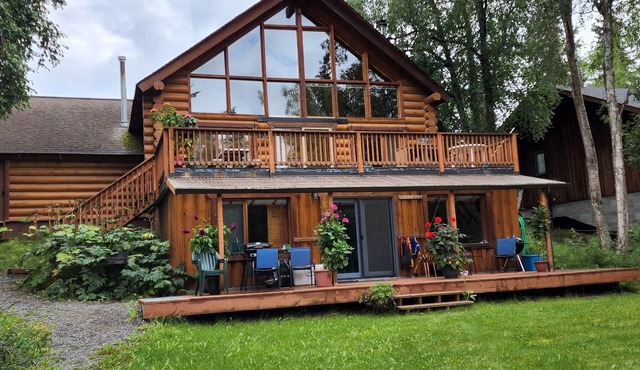 Close to Soldotna, large home on the Kenai River. Sleeps 15, 7 bedrooms, 6 bath