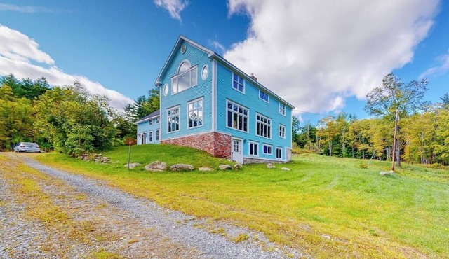 Delightful updated farmhouse with original features, patio, and & W/D