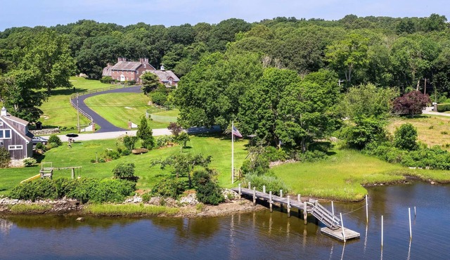 Iconic Charming Estate Overlooking Cove with Water Access in Peaceful Stonington