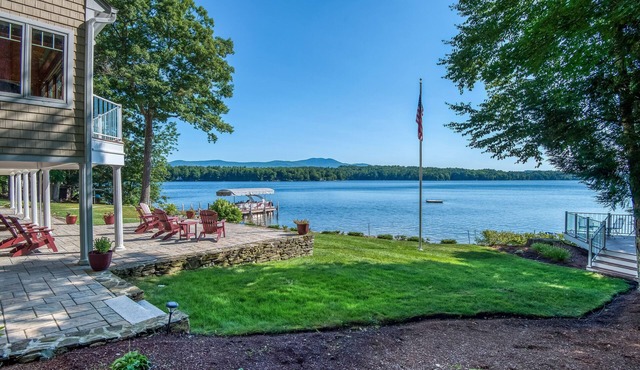 Stunning lakefront gem with full water view, beach access & dock